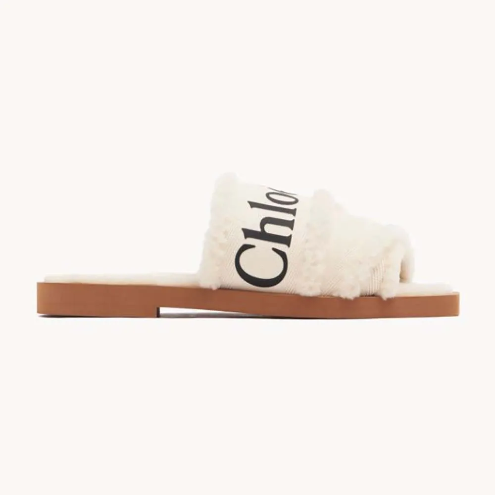 Chloe Mujer Woody Flat Mule de Lona con Borrego