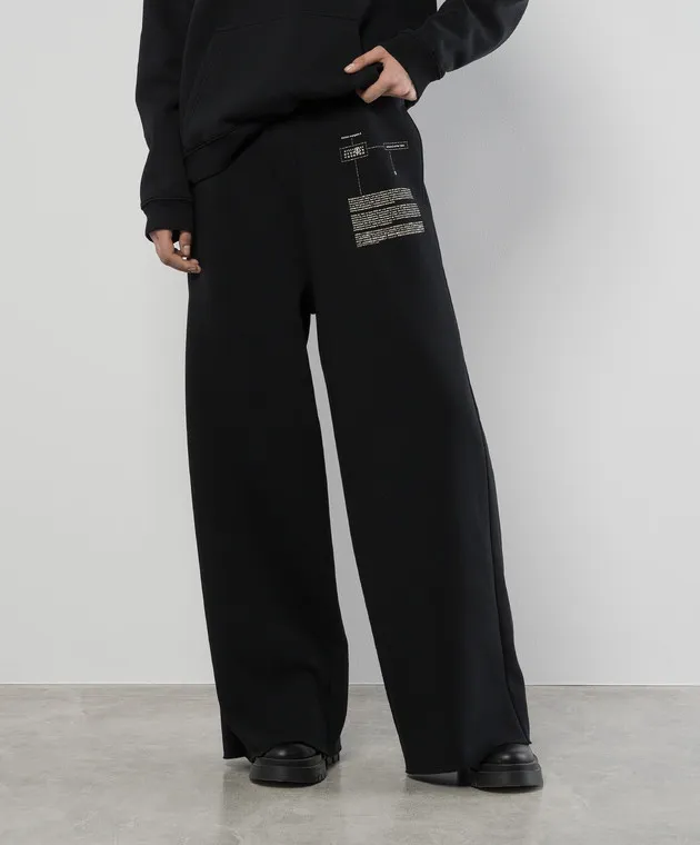 Maison Margiela MM6 Black sports pants with a print