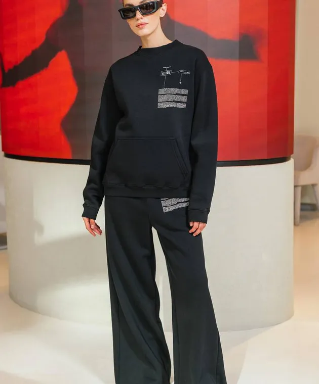Maison Margiela MM6 Black sports pants with a print