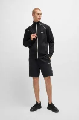 Sudadera de algodón elástico con cremallera, ribetes y detalle de la marca